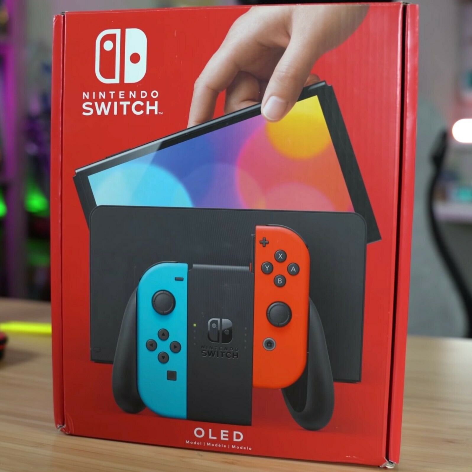 Nintendo Switch OLED 64 гб Внутренняя память 7-дюймовый экран с белым и  неоново-синим / красным Joy-Con - оригинал | База поставщиков на Qoovee